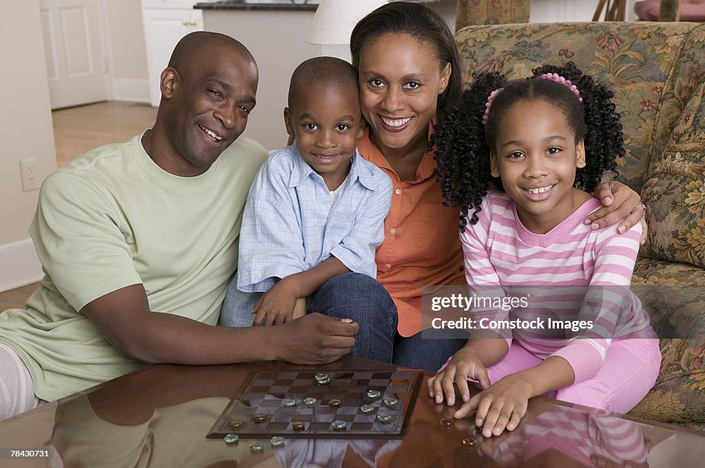 Family playing board games