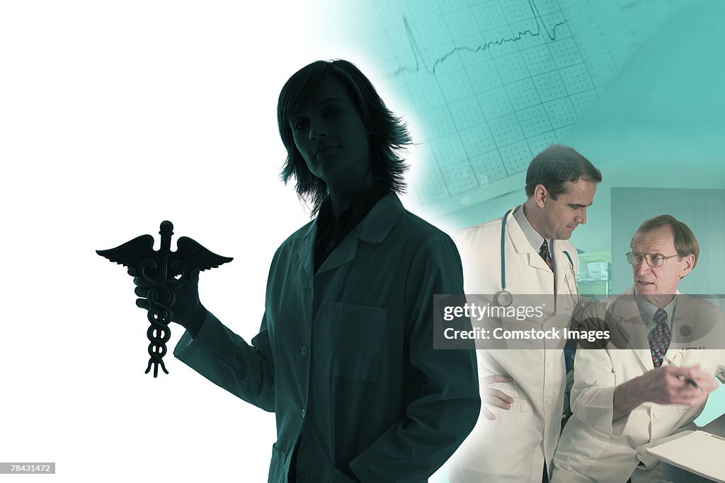 Doctor holding caduceus