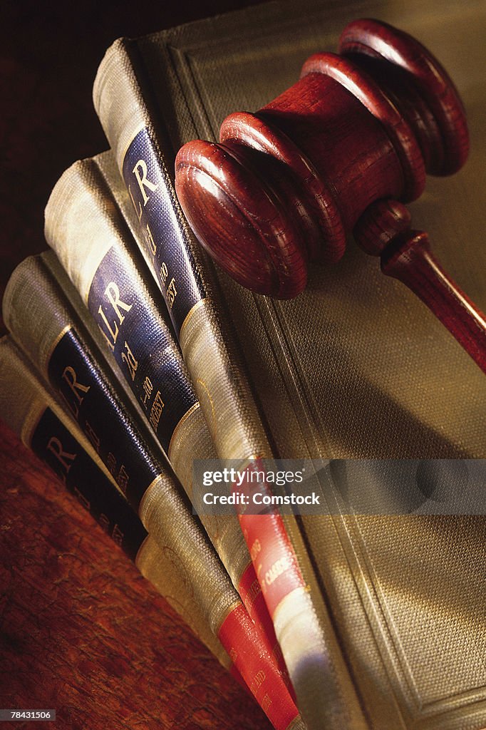 Gavel on top of legal books
