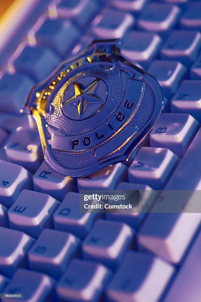 Random Key Police Police Badge On Computer Keyboard High-Res Stock Photo - Getty Images