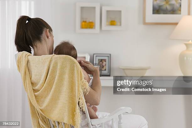 546 Mom And Baby In Rocking Chair Stock Photos, High-Res Pictures, and ...