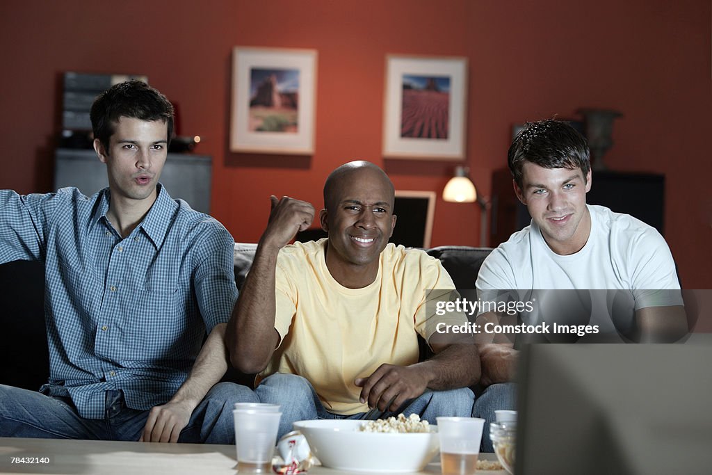 Men watching television