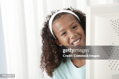 Peering Lady Computer Girl Peering From Behind Computer Screen High-Res Stock Photo - Getty ...