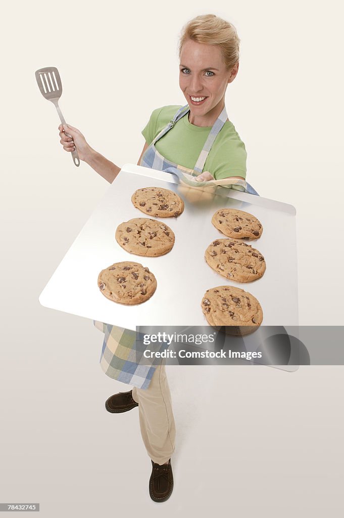 Woman with tray of cookies