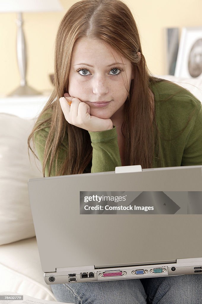 Teenager with laptop