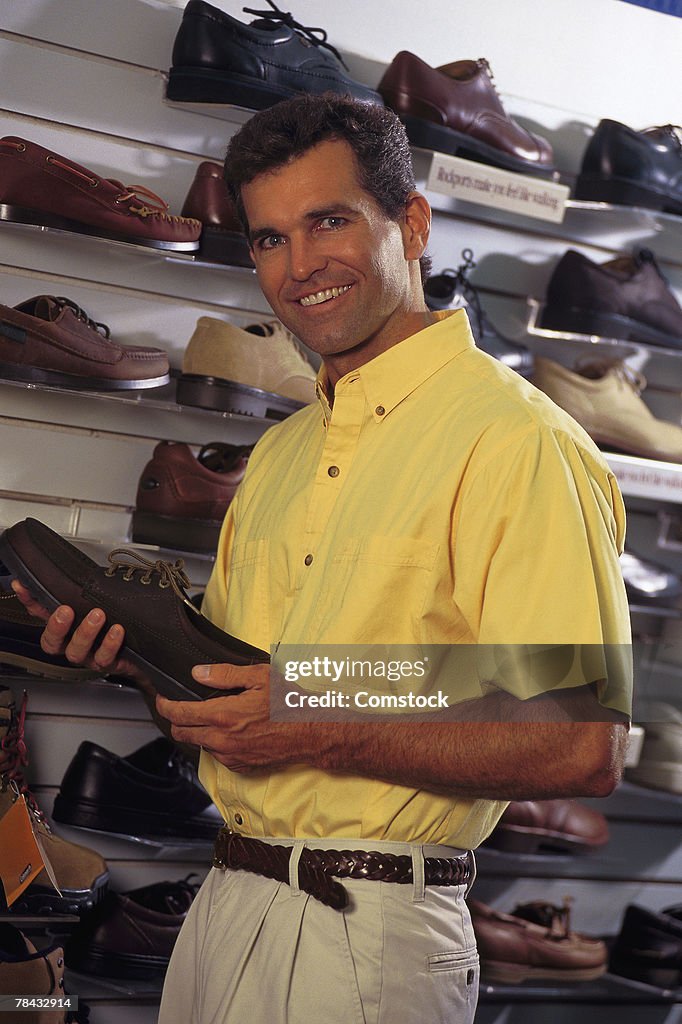 Man in shoe store