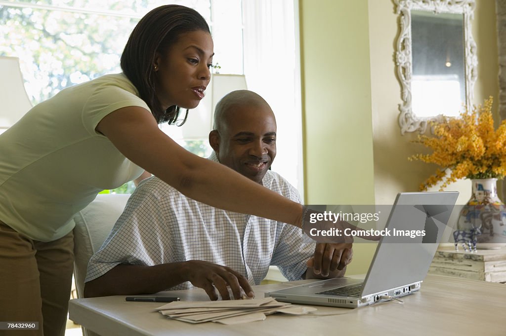 Couple with laptop computer