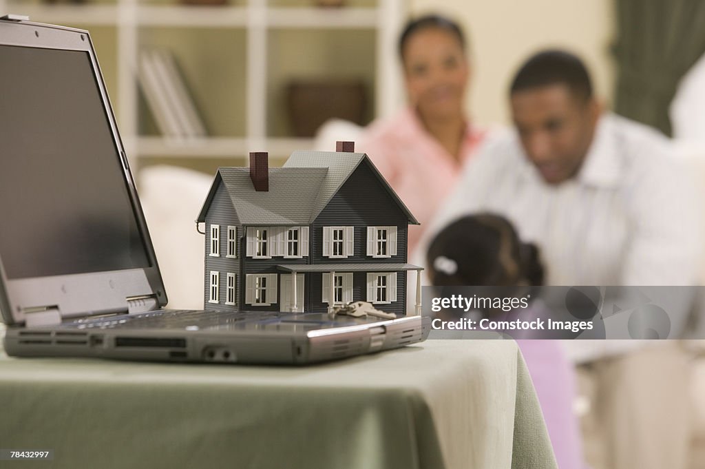 Model house and laptop computer