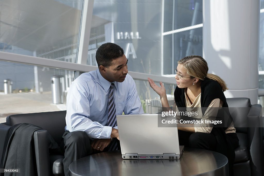 Businesspeople with laptop