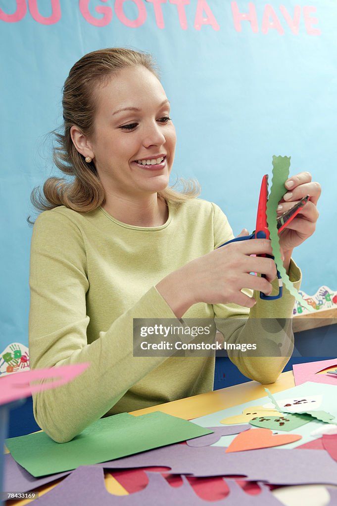 Teacher with arts and crafts