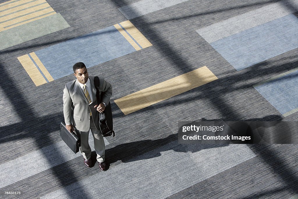 Businessman carrying luggage
