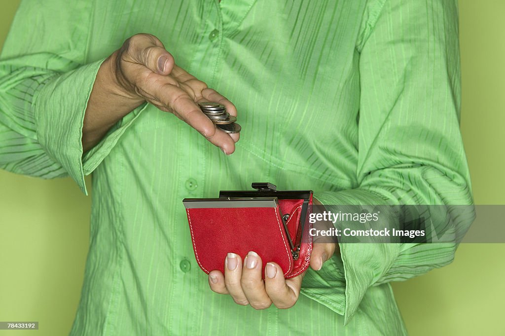 Woman with change and change purse