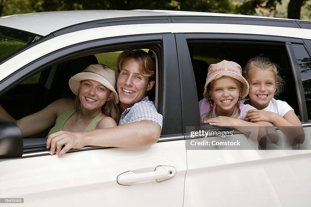 Family looking out of car window