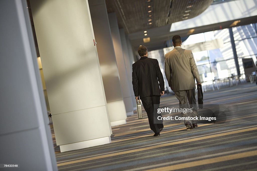 Businessmen walking