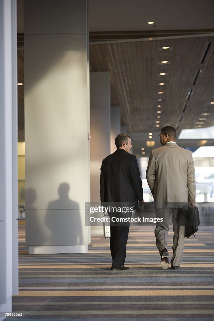 Businessmen walking