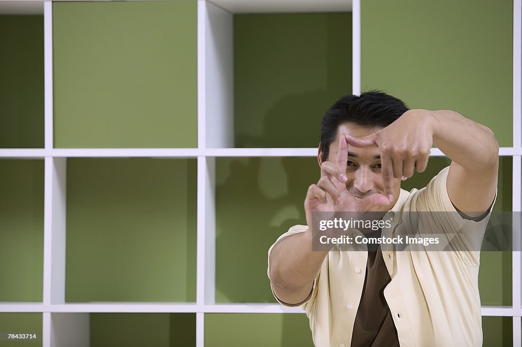 Man making hand gesture