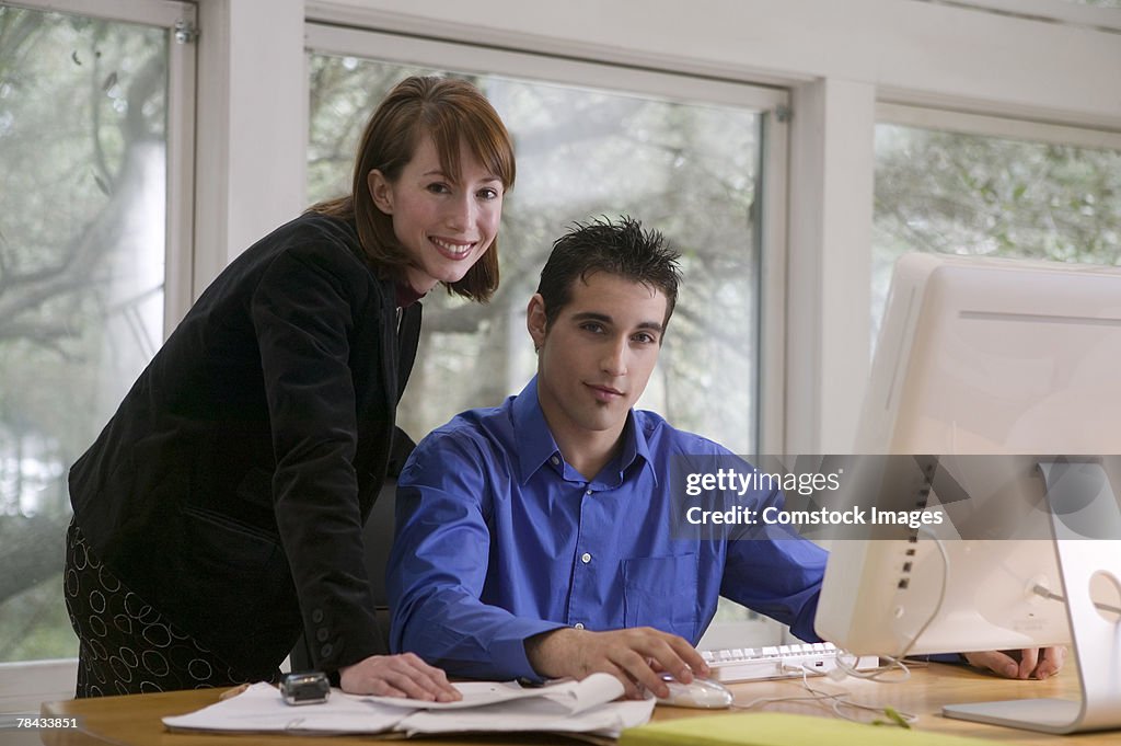 Two people with computer