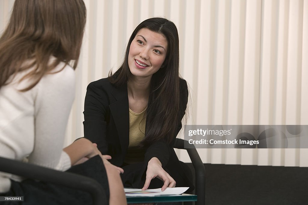 Businesswomen talking