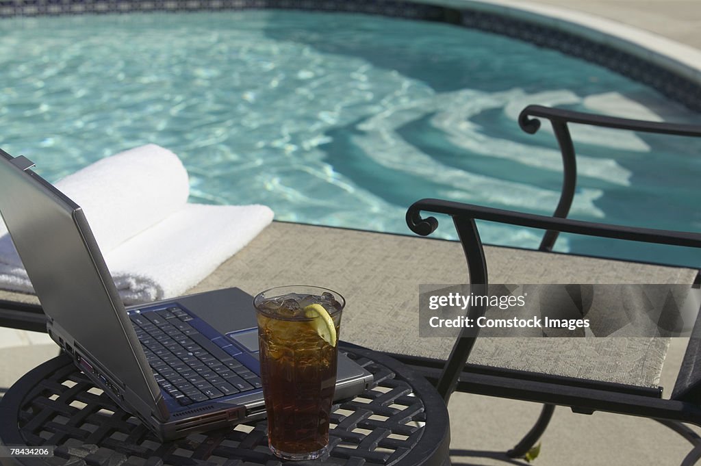 Laptop by pool