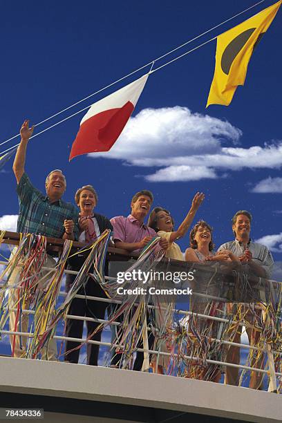 people on deck of cruise ship waving goodbye - bon voyage stock pictures, royalty-free photos & images