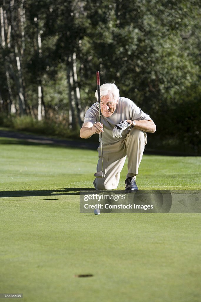 Man playing golf