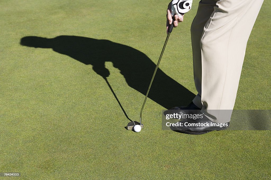 Person playing golf