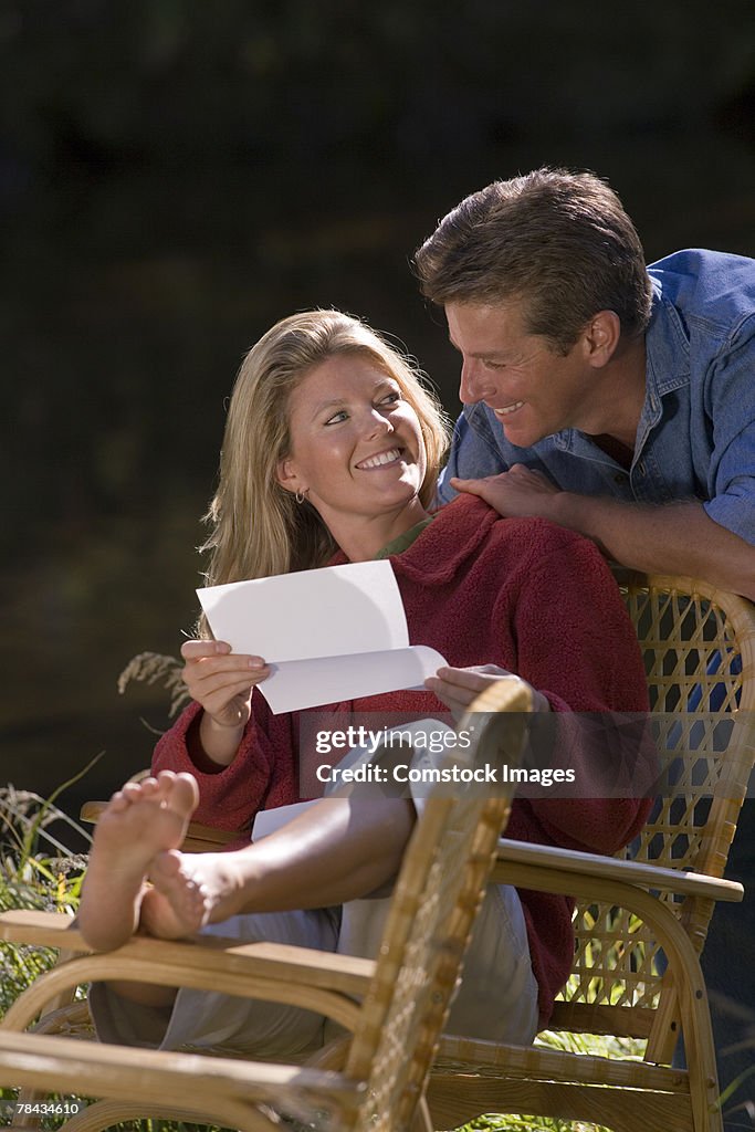 Couple reading letter