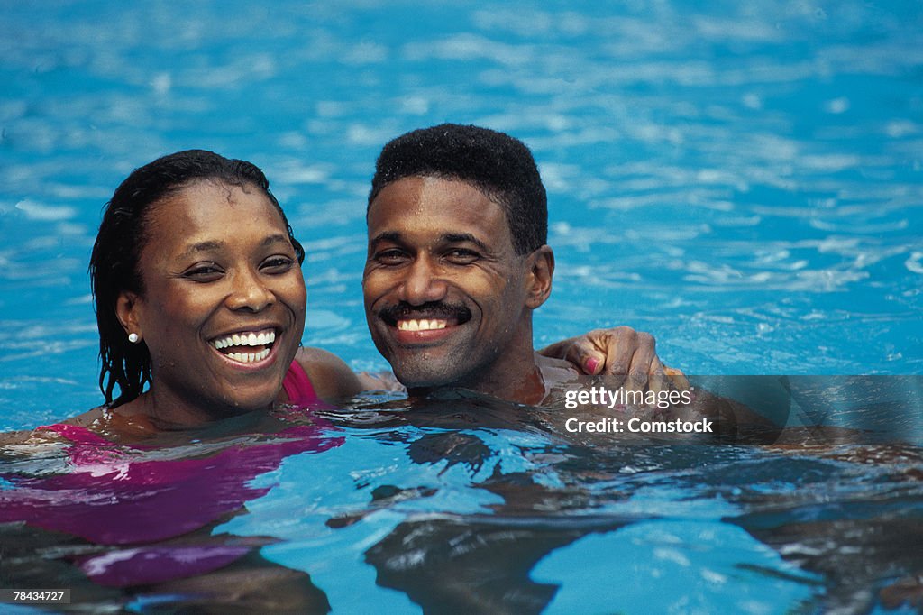 Couple in swimming pool