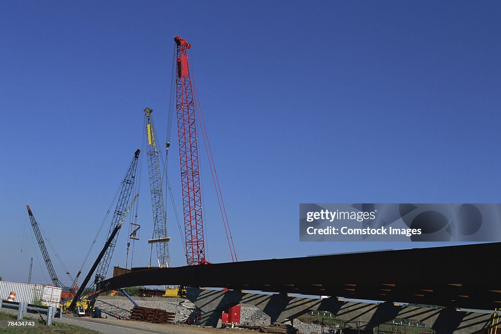 Cranes at road construction site