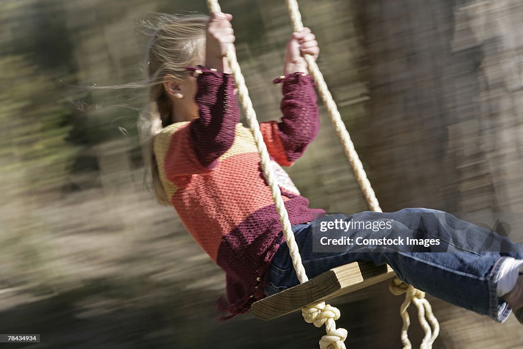 Girl swinging