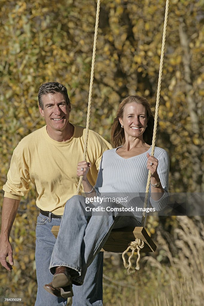 Couple swinging