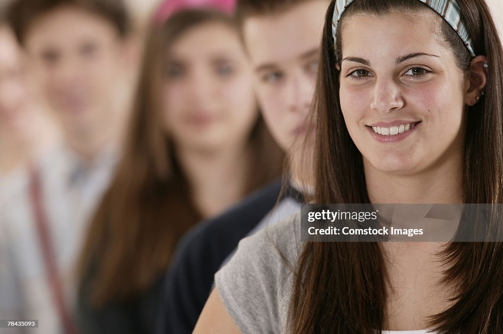 Smiling girl with friends