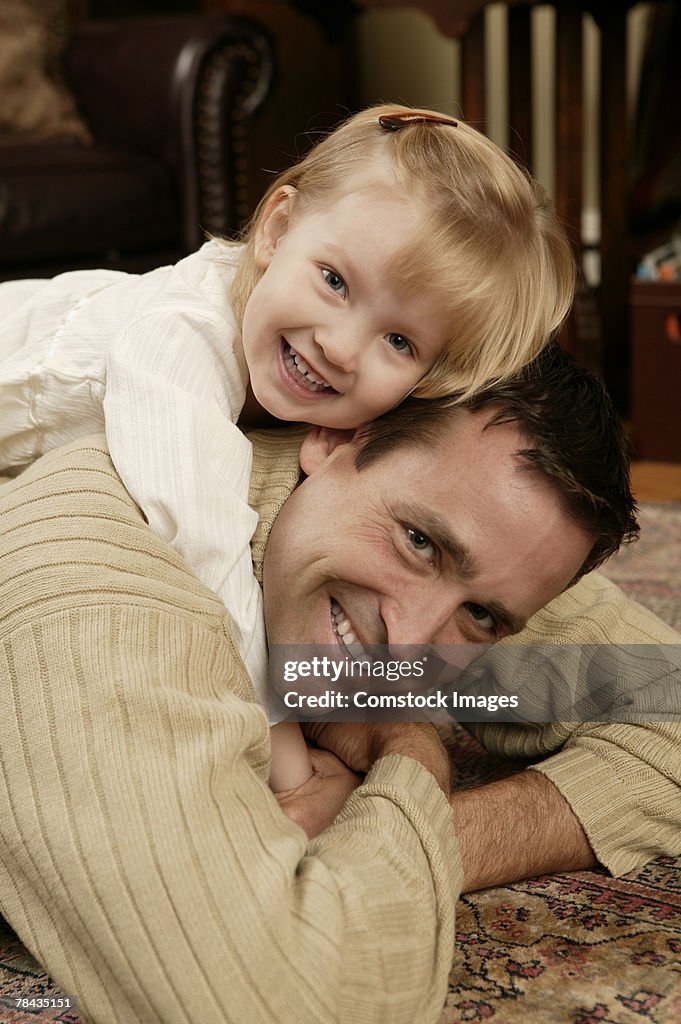 Father and daughter playing