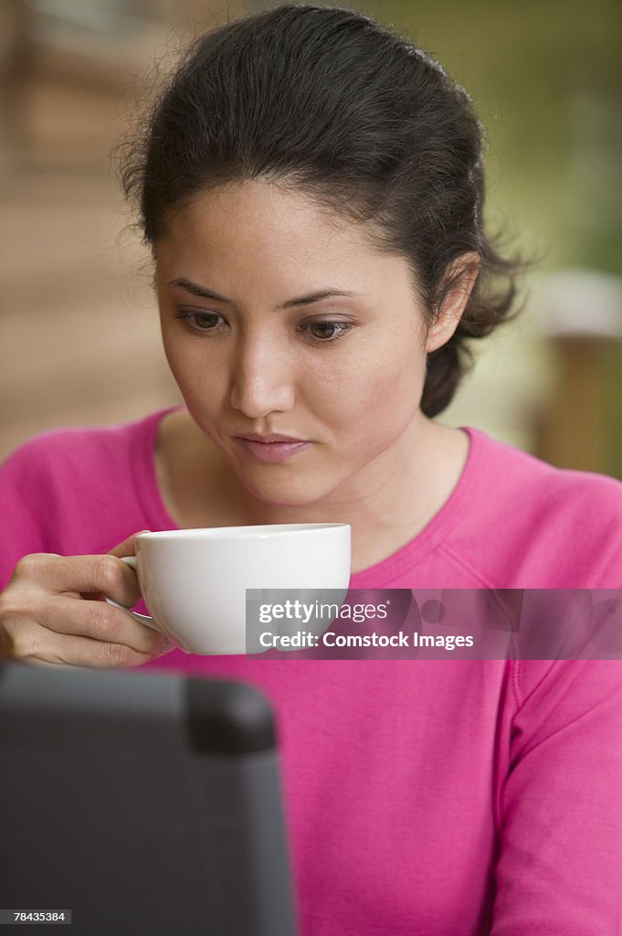 Woman drinking coffee