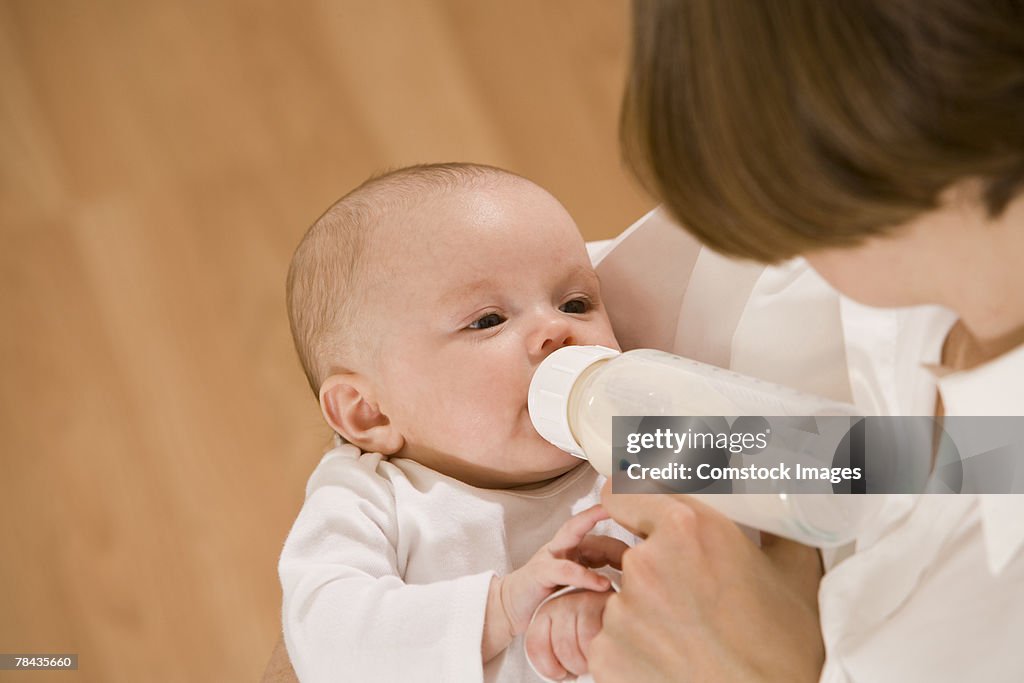 Mother feeding her baby