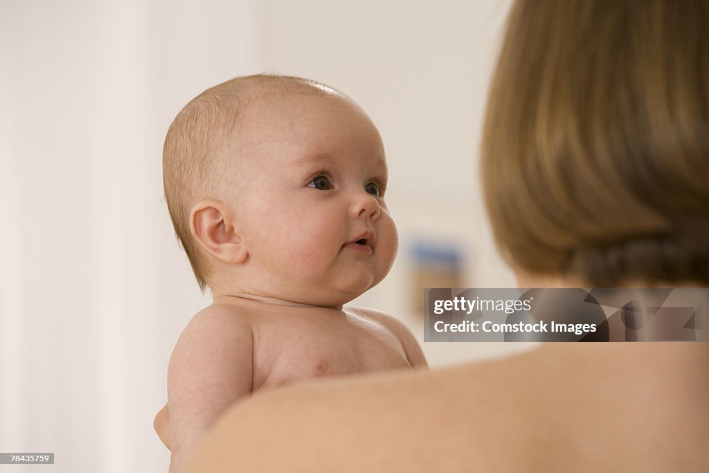 Mother holding her baby