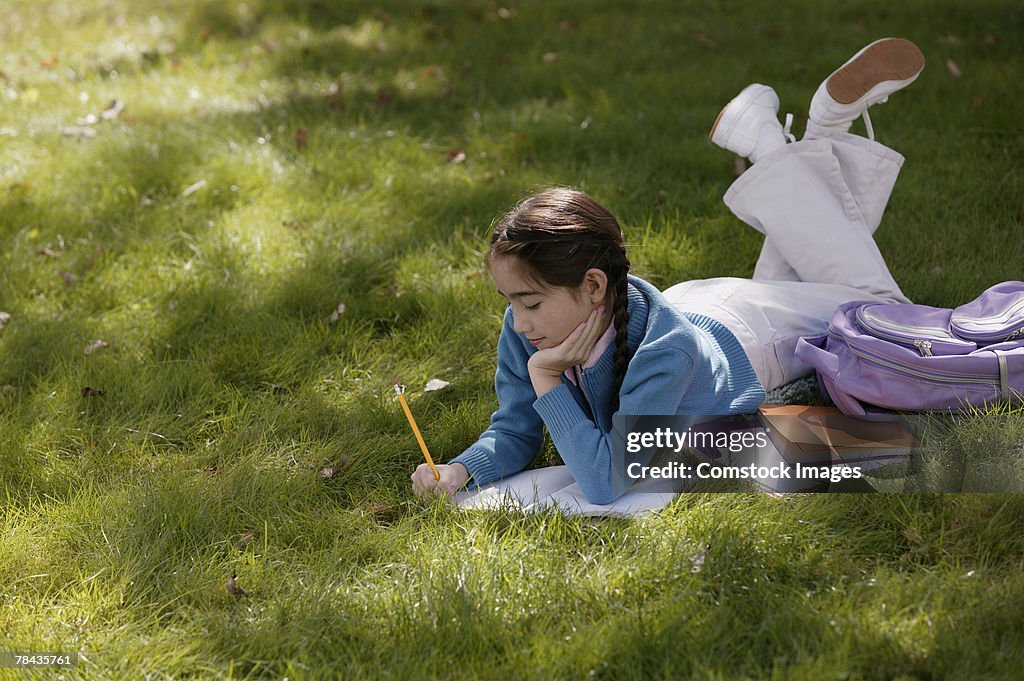 Girl studying outdoors