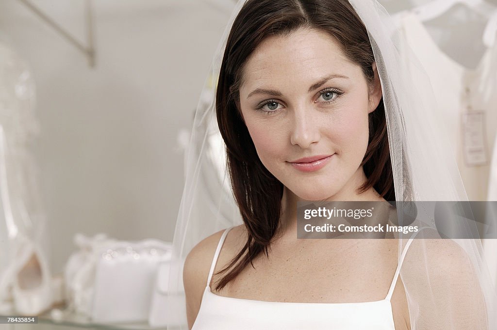 Smiling woman in wedding dress