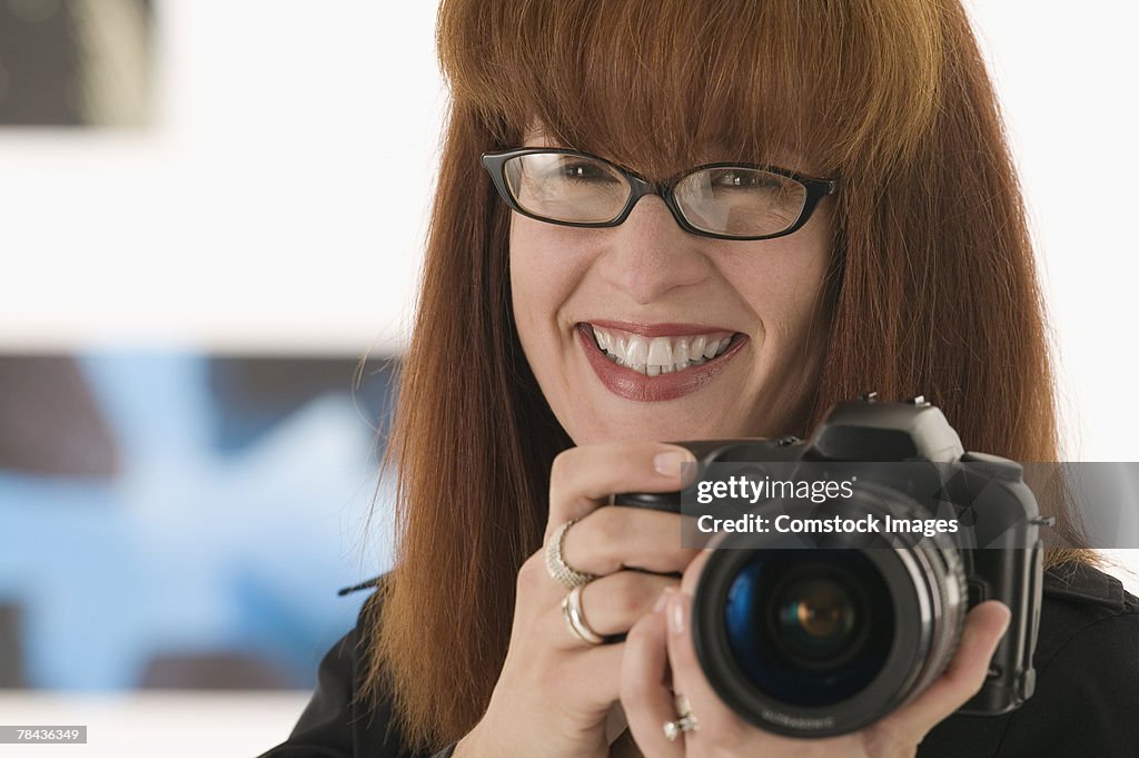 Woman holding camera