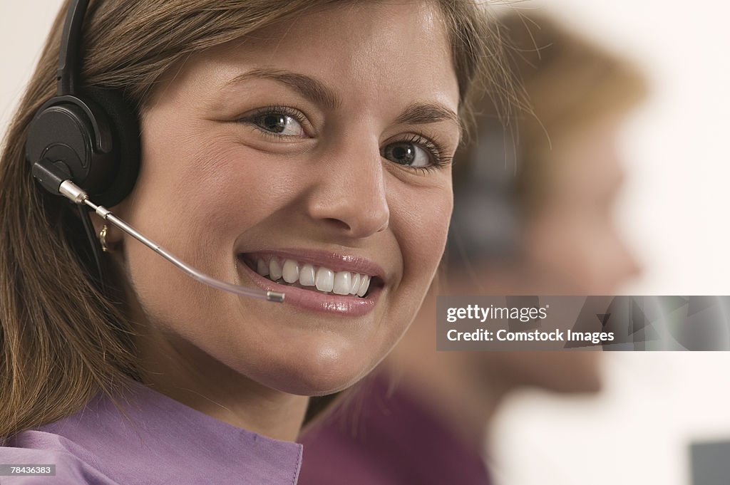 Telemarketer wearing headset