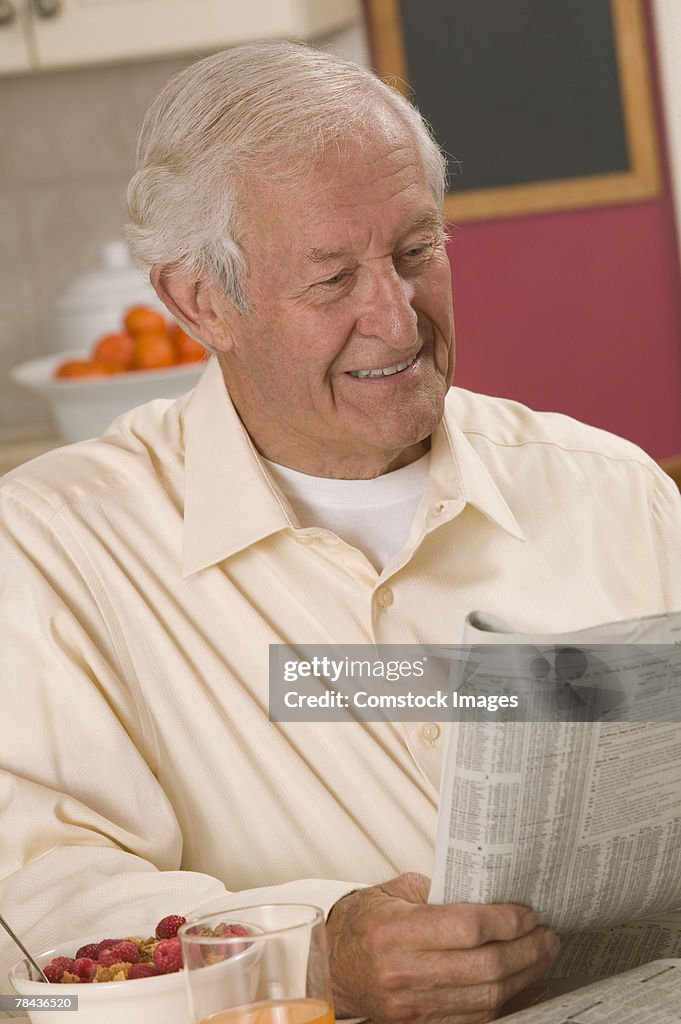 Man reading newspaper