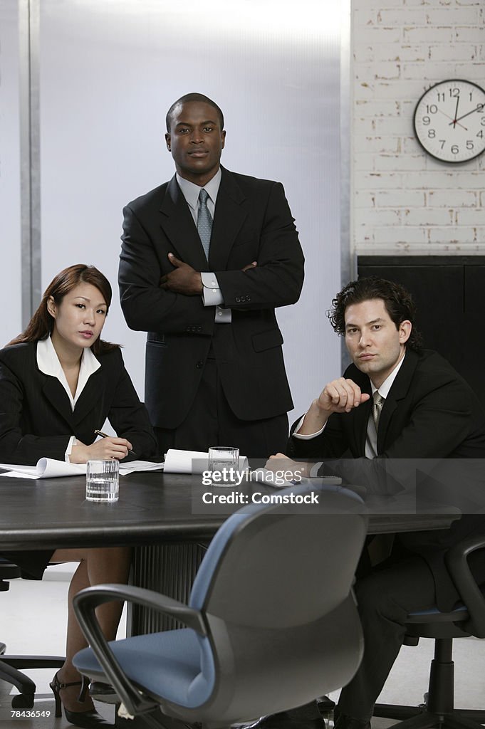 Businesspeople posing at workplace