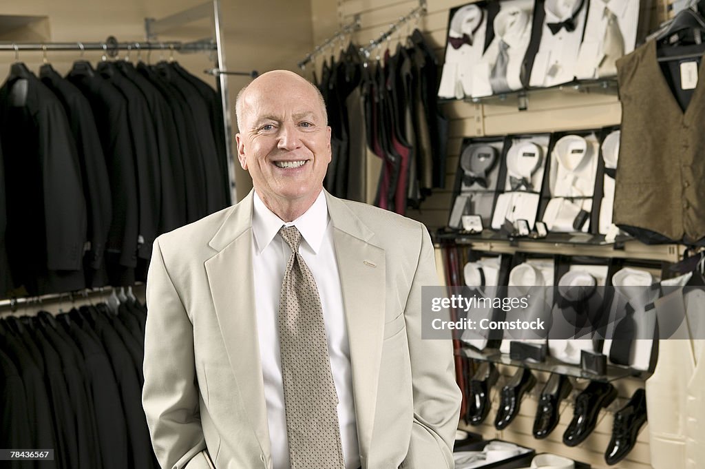 Portrait of small business owner in clothing store