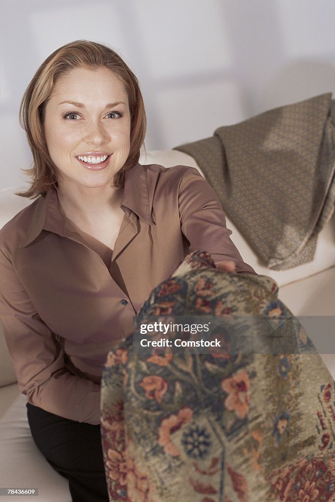 Interior designer showing fabric