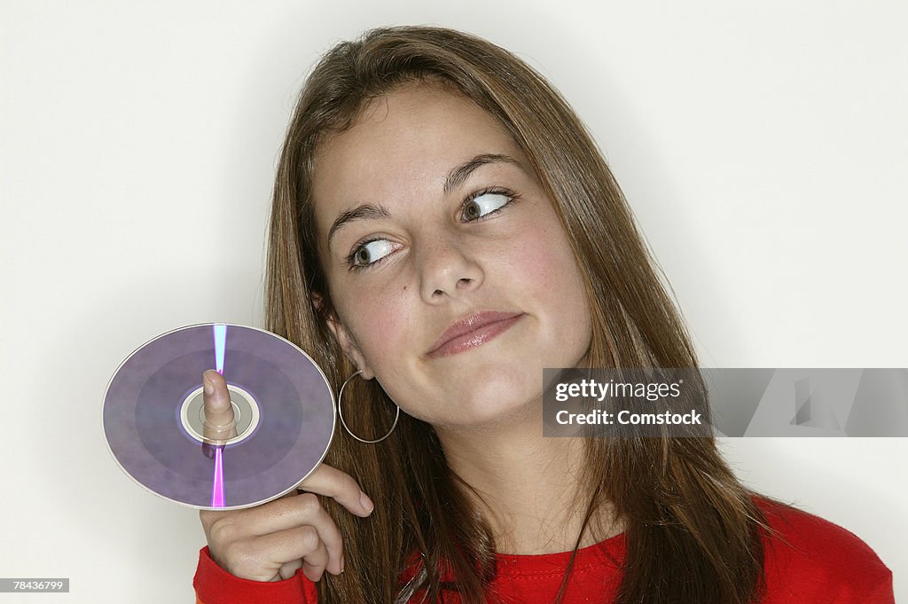 Young woman posing with CD