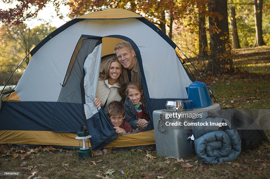 Family sitting in tent