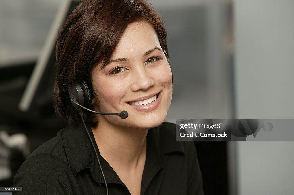 Woman posing with headset