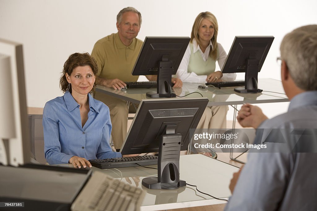 Businesspeople conversing in a meeting