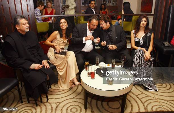 An unidentified guest, actors Parveen Duranj, Kabir Bedi, director Akbar Khan and actress Pooja Batra attend a party for the movie 'Aids Jaago'...