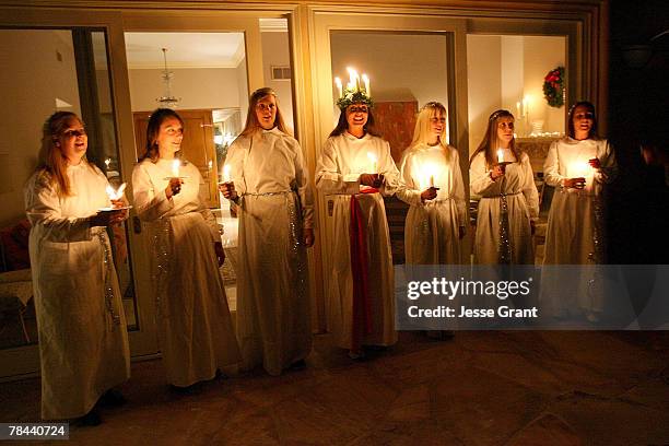 Swedish Lucia performance at the Volvo christmas party hosted by Swedish Consul General Nina Ersman and held at Nina Ersman 's home on Decemebr 12,...